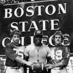 Mr. Singleton (center), the head coach at Boston State College in 1975, was believed to be the first African-American to head a college football team in the region since 1904. 